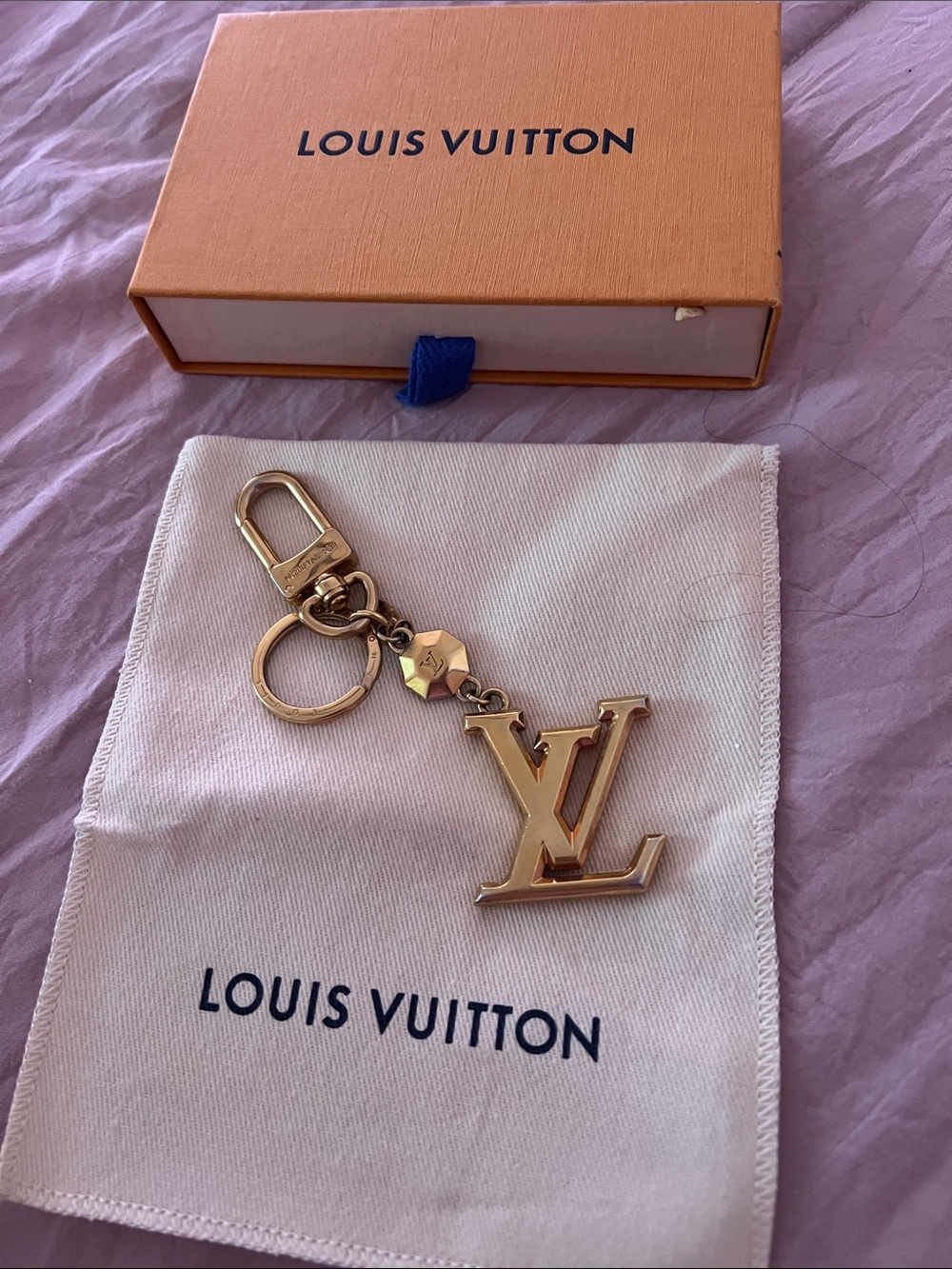 Louis Vuitton Gold-Tone LV Logo Key Holder